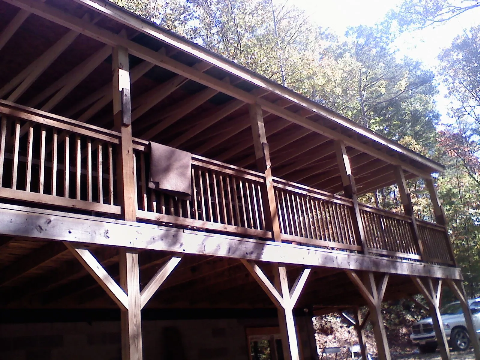 Timber framing under a new elevated porch and deck — Roof Leak Repair in Cimarron by Roofing Brothers